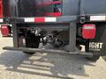 2013 RAM 2500 truck rear view showcasing the rear axle assembly and bumper with brake lights and towing hitch