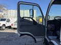 2014 Hino 195 truck cab door opened showcasing the interior including the driver's seat dashboard and controls