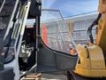 A 2018 Sandvik Ranger DX800 with an open cabin door showcasing the driver's seat and control panel inside the vehicle