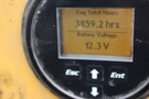 Display screen of a 2015 Vermeer Corporation BC1200XL showing engine total hours as 3859.2 and battery voltage as 12.3 V