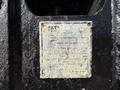 A weathered identification plate from a 2022 Caterpillar 306 excavator displaying model and specifications details