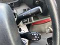 Steering wheel controls of a 2018 Hino 195 including turn signal lever and cruise control buttons