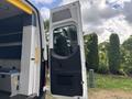 A 2020 Mercedes-Benz Sprinter 2500 van with the rear door open revealing a spacious interior designed for cargo or equipment storage