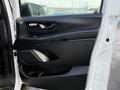 2020 Mercedes-Benz Metris door panel featuring controls for windows and locks with a sleek black finish and ergonomic design