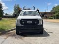 2017 Ford F-550 with a white exterior and a front-mounted plow attachment visible