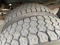 Close-up of the rugged tires of a 2016 RAM 5500 showcasing deep tread patterns and wear on the rubber surface