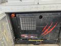 A black VMAC RAPT AIR 60 air compressor with red claw marks on the side and an orange light on top