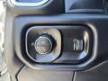 A control panel featuring buttons for headlights and fog lights with a knob for adjusting brightness