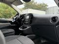 Interior view of a 2020 Mercedes-Benz Metris showcasing a dashboard steering wheel and front seats in a modern design