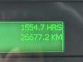 2016 Freightliner 108SD display showing 1554.7 hours and 26677.2 kilometers