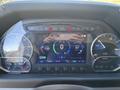 The dashboard of a 2022 Lion Lion6 displaying speed, range, average speed, and various control indicators with a digital interface