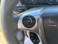 Close-up of the steering wheel control buttons on a 2017 Ford Transit-350 featuring navigation and settings controls