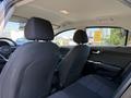 Interior view of a 2018 Kia Rio5 showcasing the front seats and dashboard with a focus on the modern design and fabric materials