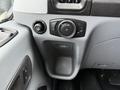 Dashboard control panel of a 2019 Ford Transit featuring knobs and buttons for lighting and other vehicle functions