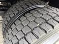 Close-up of a tire from a 2020 Ford F-550 showing deep treads designed for traction and durability