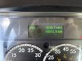 Dashboard of a 2019 Freightliner M2 106 displaying engine hours and kilometers driven with green digital readouts