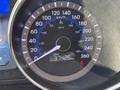 Dashboard of a 2015 Hyundai Sonata showing a speedometer with a needle pointing just above 60 mph and an odometer reading of 37426 km
