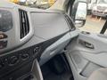 Dashboard and interior controls of a 2017 Ford Transit with dials and a digital display visible