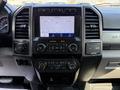 Interior dashboard of a 2020 Ford F-350 SD featuring a touchscreen display control panel with audio and climate controls