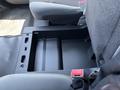The image shows the center console of a 2019 Ford F-150 with a storage compartment and USB ports visible