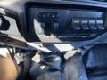 Dashboard control panel of a 2016 Ford F-250 SD featuring switches for auxiliary power and an inverter with a warning label
