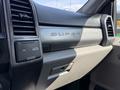 Dashboard of a 2020 Ford F-350 SD featuring ventilation vents and a textured panel with the words SUPER DUTY embossed on it