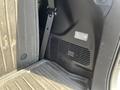 Interior of a 2018 Toyota Highlander showing a section with textured flooring seatbelt and a vent panel