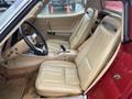 Interior of a 1970 Chevrolet Corvette featuring beige leather seats and a simple dashboard design