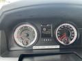 Dashboard display of a 2016 RAM 5500 showing speedometer fuel gauge and warning lights with a temperature reading of 27 degrees Celsius