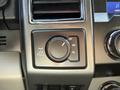 Close-up of the 4WD control knob in a 2021 Ford F-250 SD featuring settings for 2H 4H and 4L