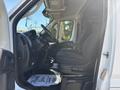 2020 RAM ProMaster 3500 interior featuring driver's seat steering wheel and dashboard with controls and floor mat displaying a thank you message