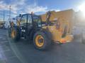 A 2013 JCB 510-56 Loadall with yellow body and black accents featuring large tires and an extended lifting arm