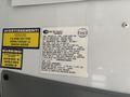 2020 Chevrolet Express with vehicle information and warning labels displayed on the interior panel