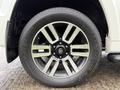 Close-up of a 2018 Toyota 4Runner wheel featuring a stylish alloy rim and Yokohama Geolandar tire detailing