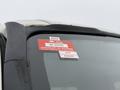 A close-up view of a 2015 Hino 195 windshield with a red certificate of approval sticker displaying the numbers GK 69930 and the months July and August 2026