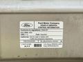 A label displaying emission control information for a 2008 Ford Econoline, including details about the vehicle's fuel type and compliance with regulations