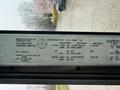 A 2012 Ford Econoline with manufacturer details and specifications visible on a metal plate inside the vehicle