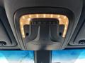 Interior overhead console of a 2020 Mercedes-Benz Sprinter 2500 featuring lights and control buttons