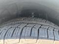 Close-up of a tire on a 2017 Chevrolet Colorado showing tread pattern and sidewall details
