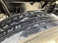 Close-up of a used tire showing tread patterns on a 2017 Freightliner MT45 with some wear and a dusty surface