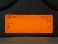 Display panel of a 2014 International 7500 showing trip information total kilometers of 30345 temperature of 12 degrees Celsius and compass direction NE