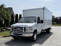 A white 2018 Ford E-450 box truck with a cargo area and a front grille displaying the Ford logo