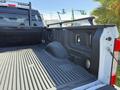 A 2017 Ford F-350 SD showing the truck bed with a textured liner and structural features
