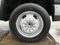 A 2008 Sterling Bullet truck wheel featuring a silver rim with multiple lug nut holes and a Goodyear tire with visible tread patterns