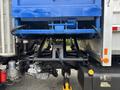 View of the rear chassis and suspension system of a 2017 Autocar Xpert truck with visible hydraulic components and support beams