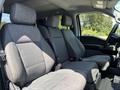 Interior view of a 2021 Ford F-150 showing front seating with cloth upholstery and a spacious design