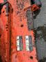 A 2012 Kubota F3680 featuring a rusty orange metal frame with visible wear and two labels providing safety instructions and maintenance details