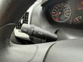 A close-up view of the steering wheel controls in a 2020 RAM Promaster featuring turn signal and headlight controls