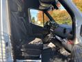 Interior of a 2021 Mercedes-Benz Sprinter 2500 showing the driver's and passenger's seats with a modern dashboard and steering wheel