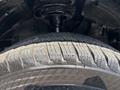 Close-up of a tire from a 2025 Ford Transit T-350 showing detailed tread pattern and wear indicators